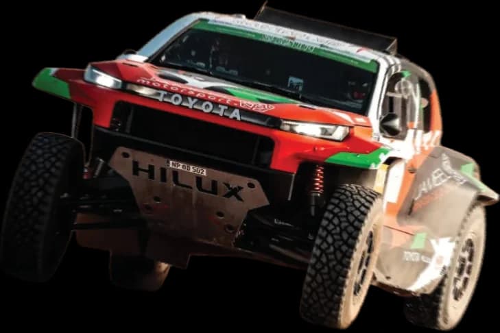 The Dakar Toyota Hilux mid-jump